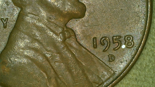 1958-Wheat-Penny-Foreign-Object-Mark?